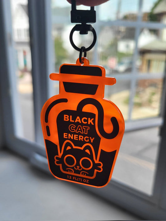 Black Cat Energy Fluorescent Orange Acrylic Keychain